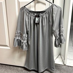 Ruffle sleeve tunic size s/m brand new with tags
